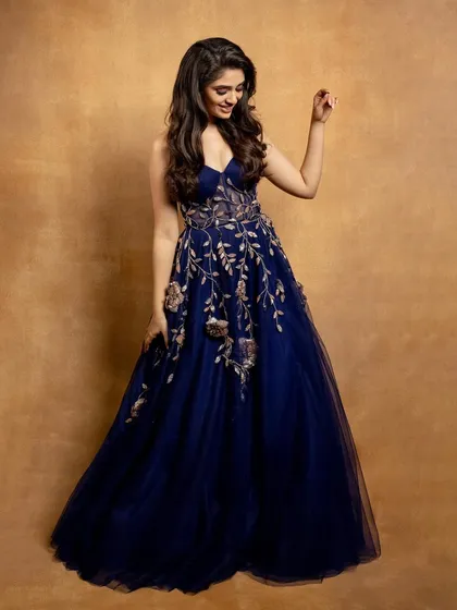 I styled the lovely Krithi Shetty for the Galatta awards in Chennai. This strapless navy blue tulle gown with floral embroidery creates a fairytale moment, perfect for a grand awards night.