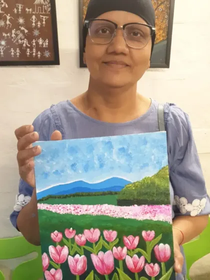 This is my brave student Anju, who discovered painting for the first time during her radiation therapy. Her courage to embrace a new hobby during such a challenging time is a true inspiration. Art became her companion for healing.