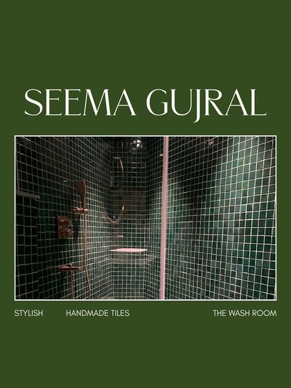 A closer look at the shower area, where the handmade emerald tiles create a stunning visual effect. The light catches the subtle imperfections of each tile, adding character and depth. This is a perfect example of how artisanal materials can elevate a simple space into something truly special.