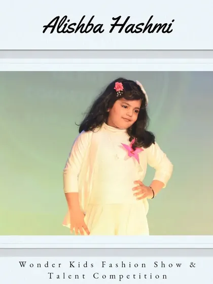 Welcome to the team, Alishba Hashmi. Her all-white outfit and graceful pose are beautiful.