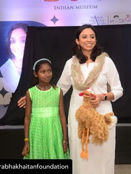With a young participant at a puppetry workshop for marginalized children, organized with the Prabha Khaitan Foundation. These workshops help build confidence and self-expression through art.