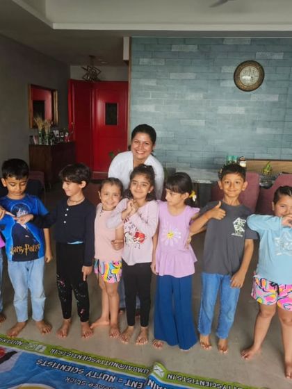 A group of happy campers posing together. The friendships and teamwork built during our sessions are just as important as the science.