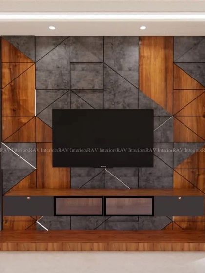 This TV unit is a work of art, combining wood, textured grey panels, and metal inlays for a geometric, modern look. The integrated glass-door crockery unit adds both functionality and a touch of elegance.