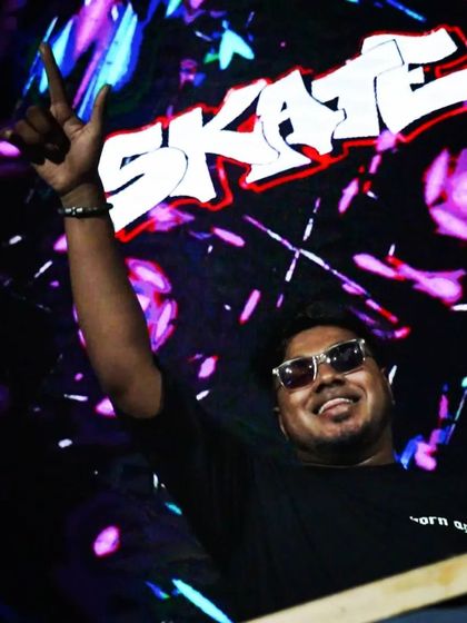 A triumphant moment on stage with my logo on the screen behind me. This is the feeling of a successful night.