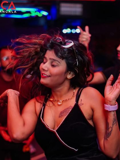A partygoer feeling the music during our Valentine's Day party.