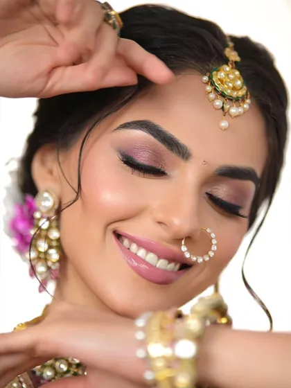 This image highlights the soft, shimmery eyeshadow and the perfectly defined brows. It’s a great example of a soft glam eye look that is both romantic and sophisticated.
