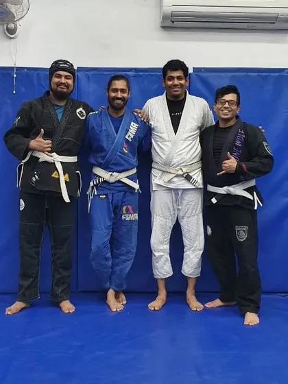A photo with students after a fundamental skills workshop. Building a strong foundation is key, and these practitioners are committed to mastering the basics.