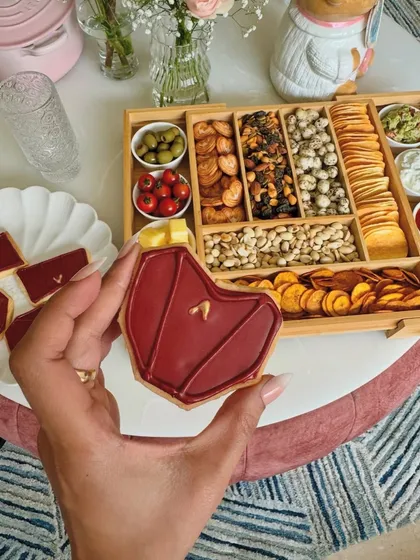 Here’s a close-up of our custom handbag cookie, designed to match the client's product perfectly. We paid close attention to the shape, the deep maroon color, and even the tiny golden logo detail.