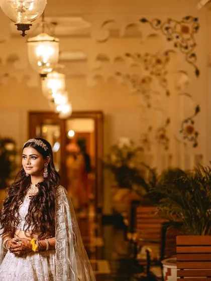 A beautiful portrait of the bride at her Sangeet in the elegant corridors of the Trident Udaipur.