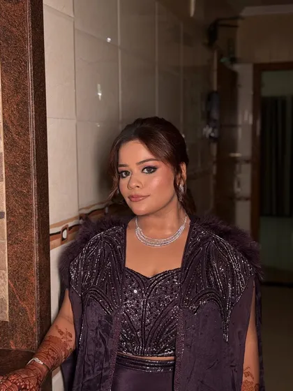 More shots of my sister Bhavisha looking absolutely radiant for her Roka. The purple outfit was complemented by a soft glam makeup look with shimmery eyes and a pretty pink lip.