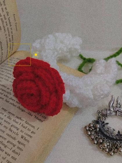My 'Manjari' crochet gajra, a modern take on the traditional hair accessory. This one features a beautiful red rose on a bed of white mogra-style crochet flowers.