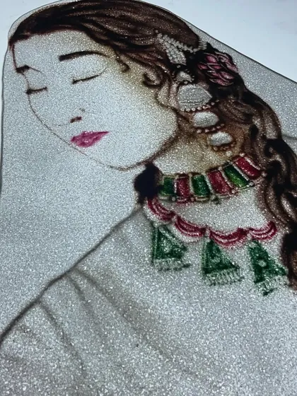 A close-up of the Anarkali sand art. Recreating such iconic tales requires a deep dive into the source material to capture the essence of the characters and their emotions, a process I deeply enjoy.