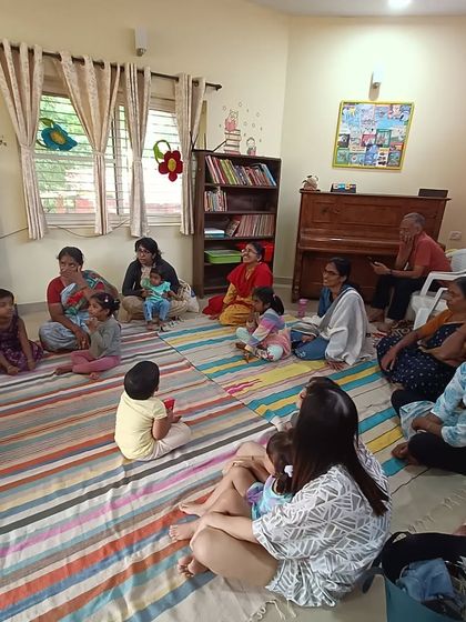 A storyteller uses actions and gestures to tell a story about an elephant, making the tale more vivid and memorable.