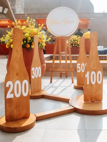 A fun, oversized ring toss game designed for the Haldi Mela. Interactive elements like this are a great way to get guests mingling and having fun.