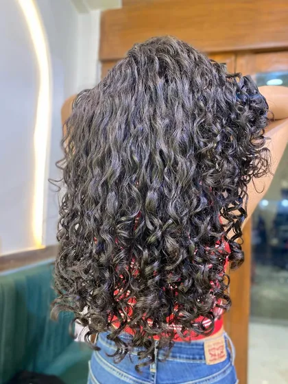 A gallery of my wonderful clients flaunting their unique and beautiful curls. Every curl pattern is different, and I love celebrating them all.