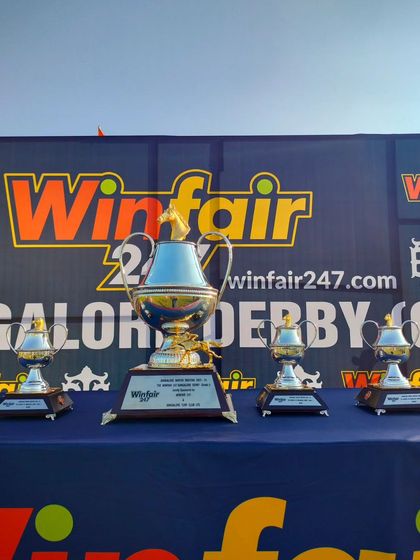 A collection of trophies for the Winfair247 Bangalore Derby, a premier event of the winter season. We offer sponsors a central role in the day's pageantry and tradition.