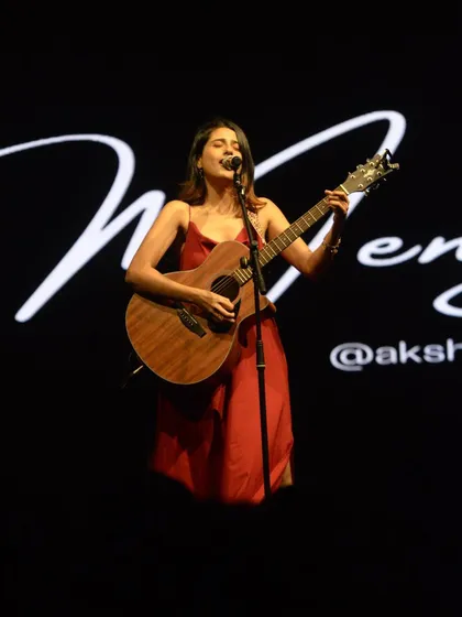 On stage, opening for Anuv Jain. My name in lights behind me, a guitar in my hand. This is what I've worked for.
