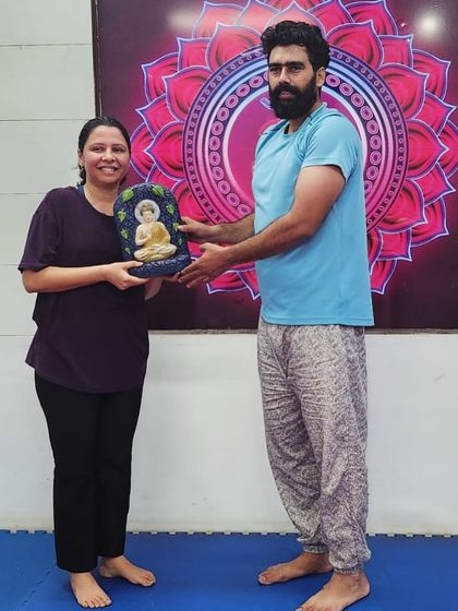 A proud moment celebrating 600 Surya Namaskars. Recognizing and honoring each other's hard work is a core part of our practice.