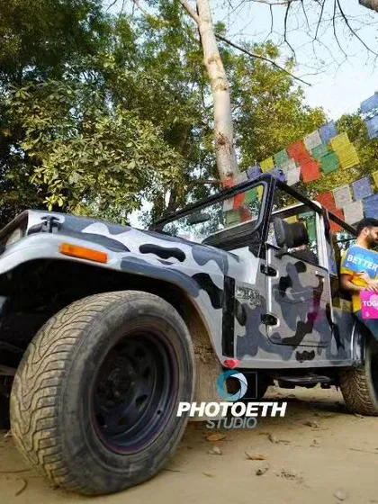 A fun and adventurous pre-wedding shot with a camo-print jeep and Tibetan prayer flags. This is for the couple that loves adventure and wants their photos to reflect their personalities.