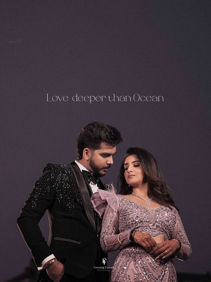 A romantic portrait of the couple, titled "Love deeper than Ocean."