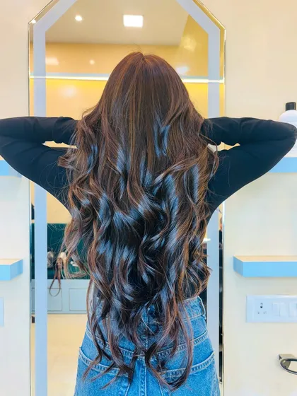The back view showcases the richness of the chocolate brown base with shimmering soft gold highlights woven throughout.