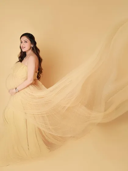 For the mamas who want to feel like a queen, a flowing gown session is pure magic. The way the fabric catches the air feels like we are capturing a dream. This is your moment to shine and feel absolutely radiant.