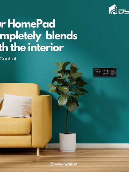 Technology and style unite with the HomePad. It is designed to blend with any interior, from modern to classic, as seen here against a bold, dark teal wall.