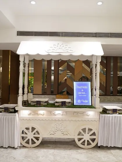 A closer look at our charming white food carts. These carts are not just functional, they are a beautiful decor element for any event.