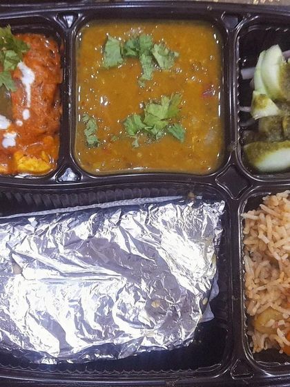 A rich and festive thali with vegetable pulao, shahi paneer, and dal. Perfect for a celebration or a special weekend lunch.