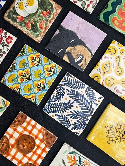 More amazing tiles from our wall project, featuring everything from Batman to abstract patterns. The creativity is off the charts.