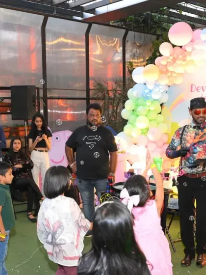 A bubble show in action at a Peppa Pig themed party. This form of entertainment is perfect for both indoor and outdoor events and always draws an engaged and happy crowd.