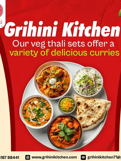 Our veg thali sets offer a variety of delicious curries. Here you can see different paneer preparations and dal, served with rice and naan.