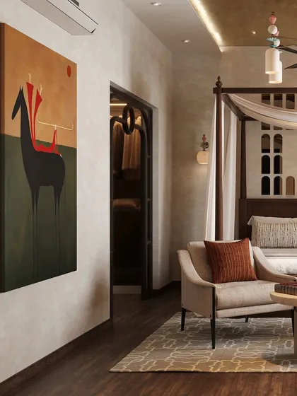 A bold piece of contemporary art adds a splash of color and personality to the otherwise neutral and calming bedroom. The view also shows the entrance to the walk-in closet.