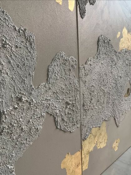 A close-up showing how the gold leaf is applied around the edges of the textured areas, creating a beautiful contrast between rough and smooth, matte and metallic.