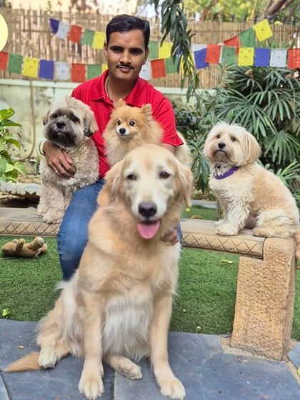 Our head of boarding, Dev Narayan Yadav, with some of his furry friends. With 14 years of experience, Dev's kindness and expertise ensure every pet receives the highest standard of care, from meals and walks to playtime.