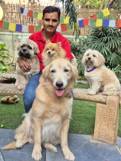 Our head of boarding, Dev Narayan Yadav, with some of his furry friends. With 14 years of experience, Dev's kindness and expertise ensure every pet receives the highest standard of care, from meals and walks to playtime.
