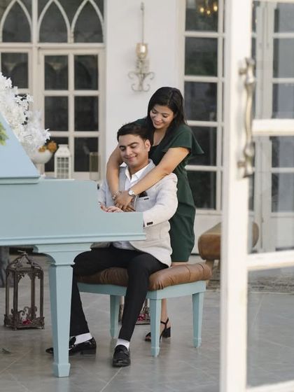 A playful moment at the piano. This shot is not just about posing; it's about creating an experience that feels natural and fun.
