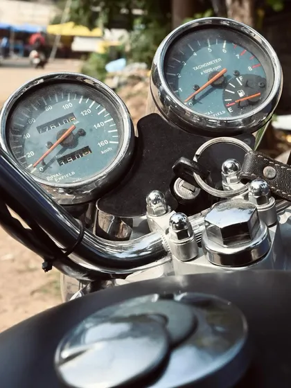 The restored instrument cluster of the Thunderbird 350, with the speedometer and tachometer looking as good as new.