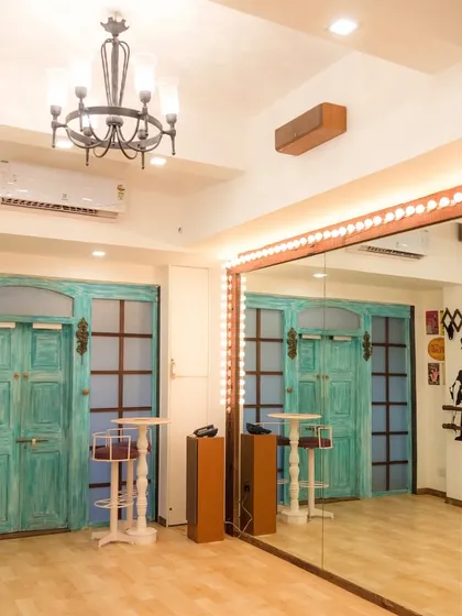 A shot of our first studio space, featuring the iconic turquoise doors and the large mirror that has reflected countless hours of dance. This space is where so many of our choreographies and classes came to life.