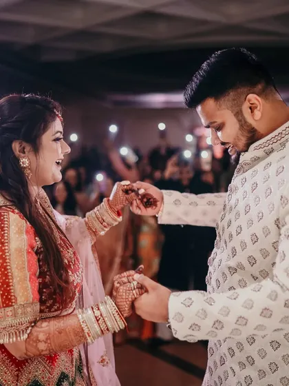 The couple's first dance as Mr. & Mrs. This candid shot captures the movement and the romantic atmosphere of the reception.