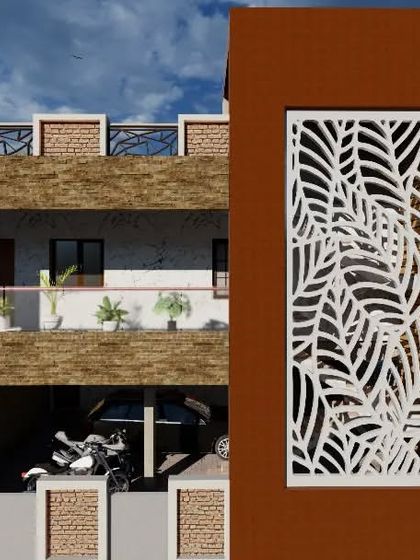 A residential exterior design featuring a prominent decorative jali screen with a leaf pattern. This element adds an artistic touch while providing shade and privacy for the floor above.