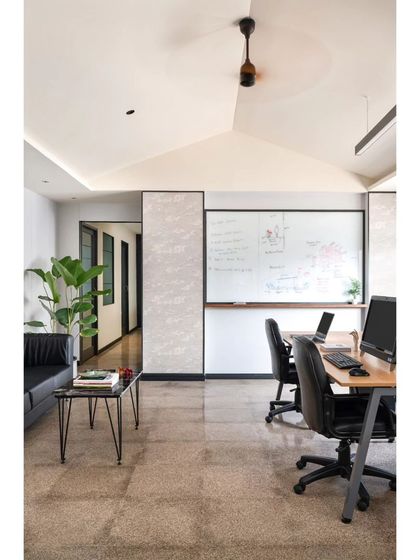 These images provide further views and details of the Project Rooftop and Noir Oak offices. They showcase everything from conference room details and corridor views to custom furniture and the play of natural light, illustrating my comprehensive approach to workspace design.