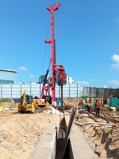 Early site progress at TCI Express World Centre. A piling rig is at work, creating the deep foundations for the building. This crucial step ensures the stability of the structure that will rise above.