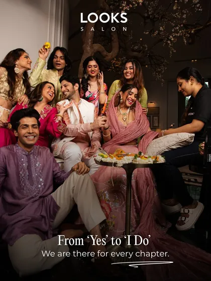 My service is about creating an experience. This moment captures the joy of the bride and her loved ones celebrating together at the salon, showing that the journey from 'yes' to 'I do' is filled with happy memories.