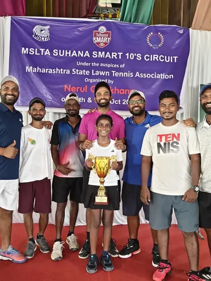 The entire Belief Tennis Academy coaching team with our U-10 champion, Trisha Bhosale.