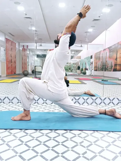 This is Ashwa Sanchalanasana (Equestrian Pose), a powerful low lunge that strengthens the legs, improves balance, and provides a deep stretch for the hip flexors.