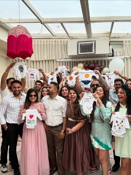 A baby shower with a creative twist! Friends and family came together to paint these adorable custom onesies, creating personal and heartfelt gifts for the baby-to-be. It's a wonderful way to make lasting memories.