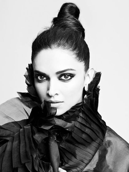 This black and white portrait of Deepika Padukone highlights the structure and intensity of the eye makeup. It shows how a well-executed smokey eye can be incredibly impactful and artistic, transcending color to focus on shape and drama.