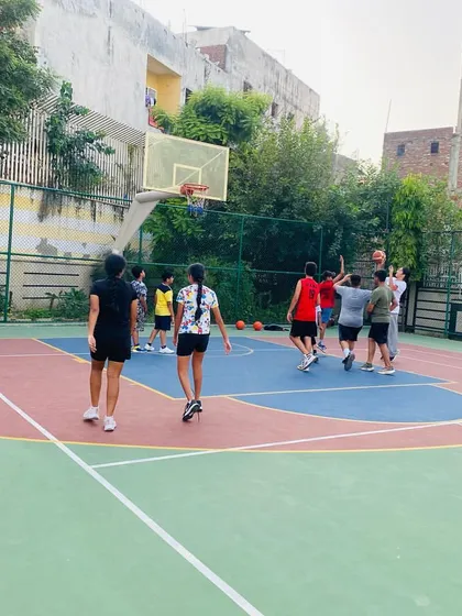 A player takes a shot in the paint.