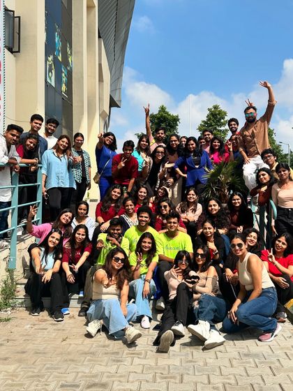 Our dance fam posing outside the Noida Stadium after a successful Dance Korner. The energy and excitement are clear on everyone's faces.